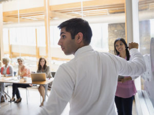 Meeting at whiteboard